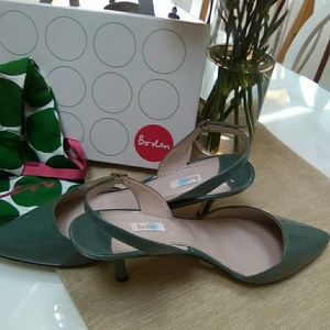 Retro 1960 slingback. Never been worn.